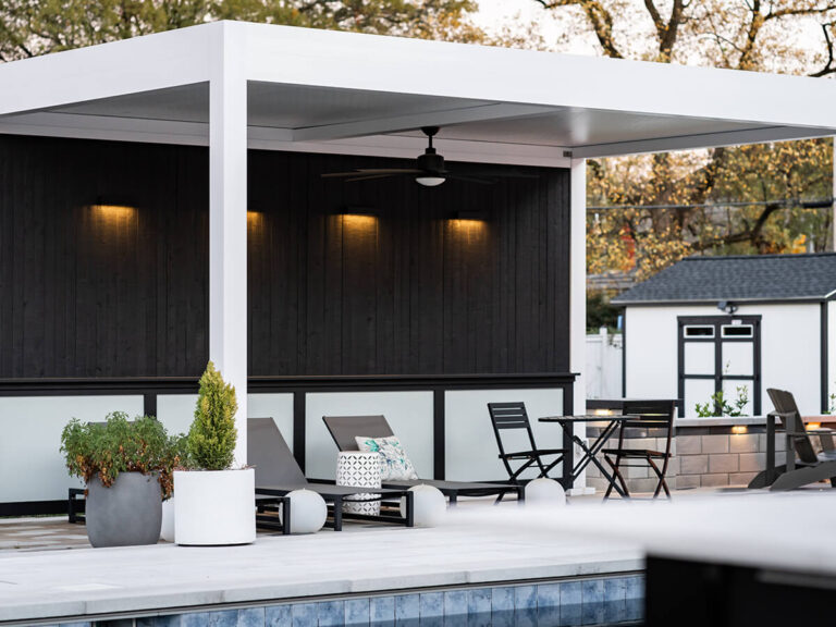 R-SHADE™ R-SHADE™ insulated patio cover with integrated lighting and outdoor furniture, showcasing durable design by Homestead Outdoor Living in Indianapolis, IN.