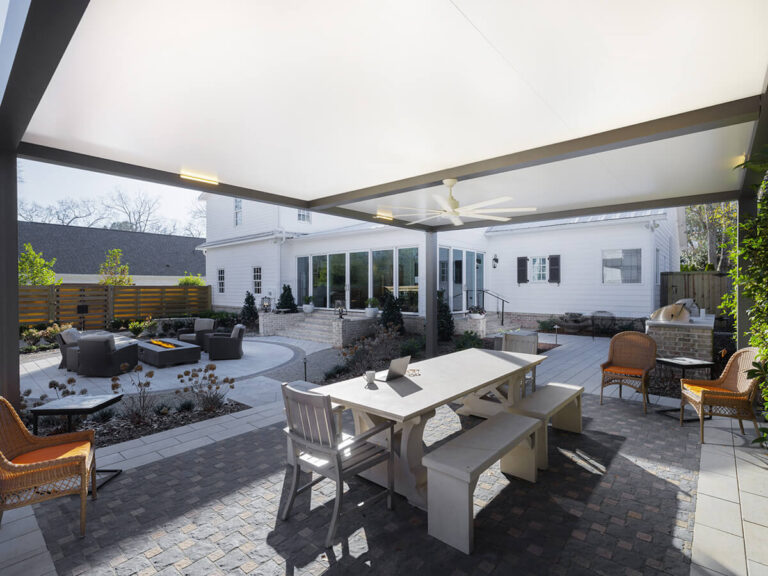 R-SHADE™ insulated patio cover providing shade and weather protection for outdoor dining area and lounge space in Indianapolis backyard.