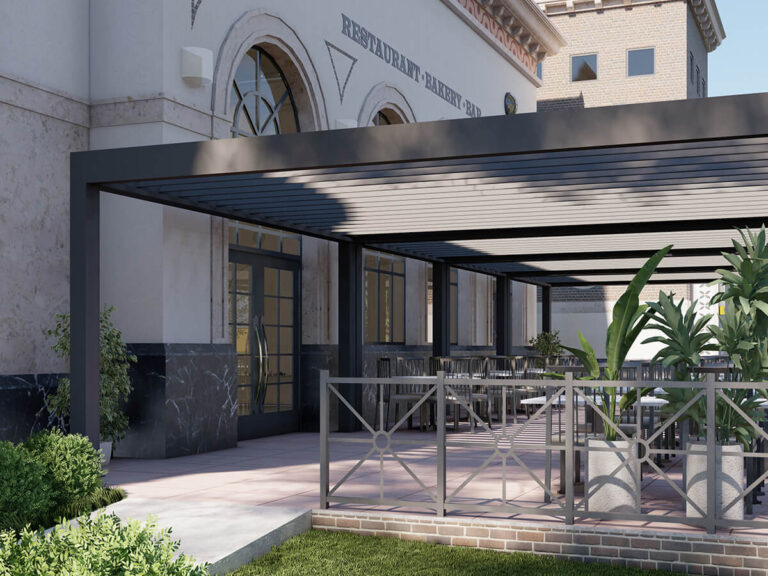 R-BREEZE™ slatted roof pergola providing shade and weather protection for a restaurant patio.